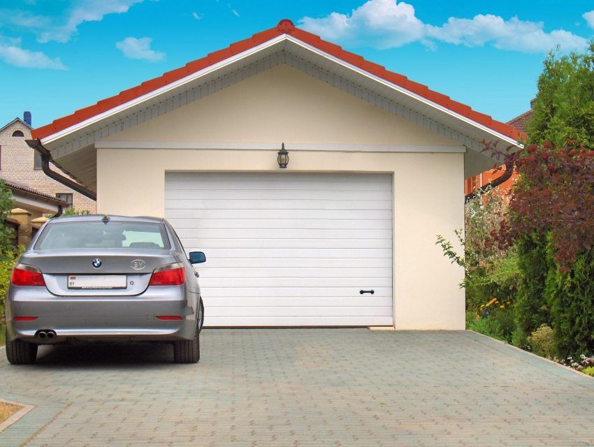 Porte sezionali per il garage: le dimensioni e il prezzo dei progetti pratici