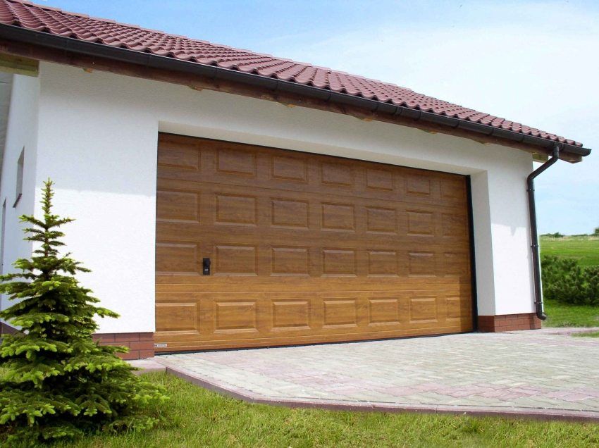 Porte sezionali per il garage: le dimensioni e il prezzo dei progetti pratici
